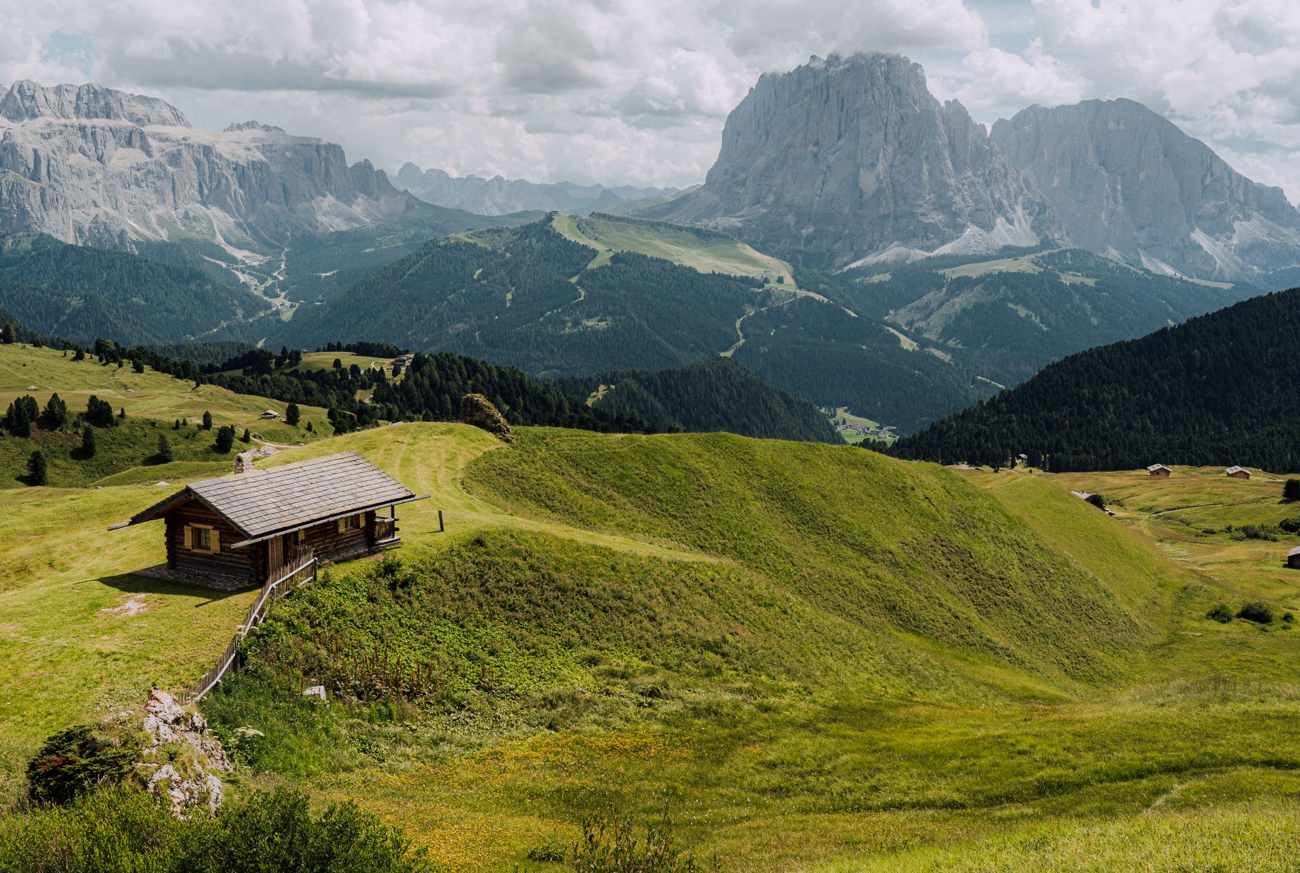 Timber cabin situated on mountain slope